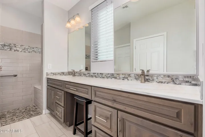 Primary Bathroom Suite with Dual Sinks, Vanity and Private Toilet room