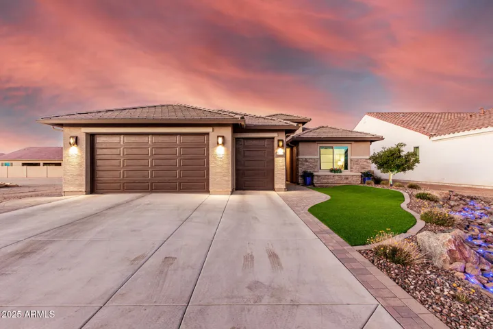 Extra-long drive plus 8 ft tall garage doors(truck will fit)
