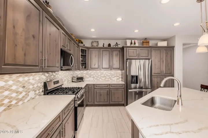 Knotty Alder wood cabinets & Shaker Crown Molding