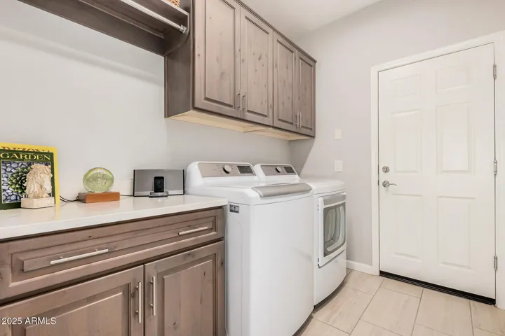 Laundry Room Extended 4 feet, upper & lower Cabinets with hanging, Washer & Dryer stays