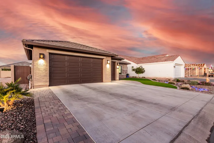 PAVERS added to drive-way and walkway to gated side yard