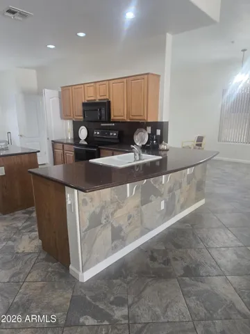 Professionally painted interior with great room kitchen living area spaciousness.