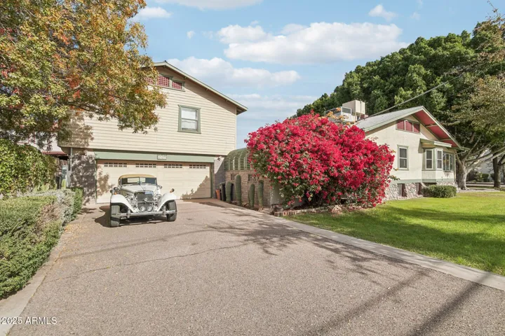 Two apartments above a 4 car tandem garage