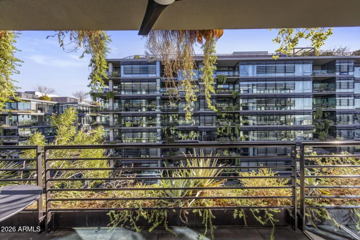 Largest 1-bedroom + den in Optima Kierland 7120. This 9th floor original 2-bedroom unit floorplan is reimagined to expansive updated 1-bedroom + den executive condo. Sub-Zero, Miele, Bosch appliances, Wine Fridge, Wine Wall, Bar, 3-way Fireplace, NE Mountain and Courtyard Views.