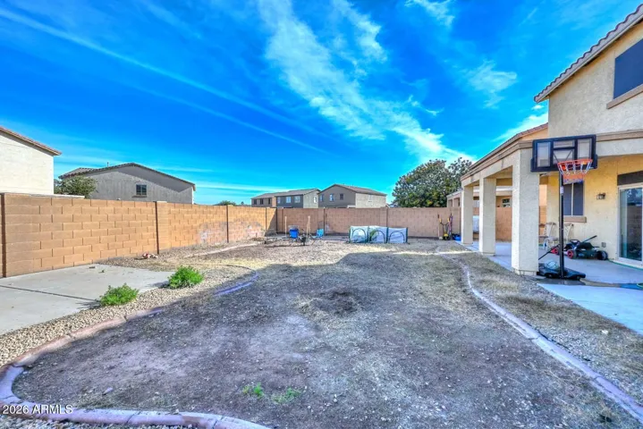Covered patio, storage shed and lots of room for your personal touches!