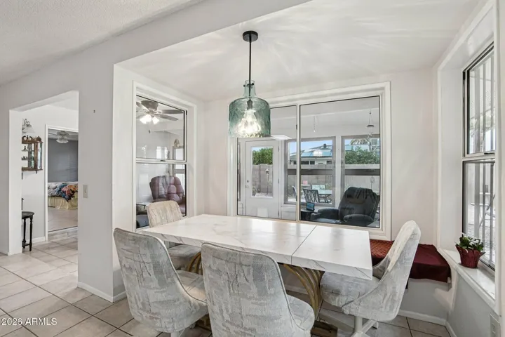 The breakfast area with a bay window seat.