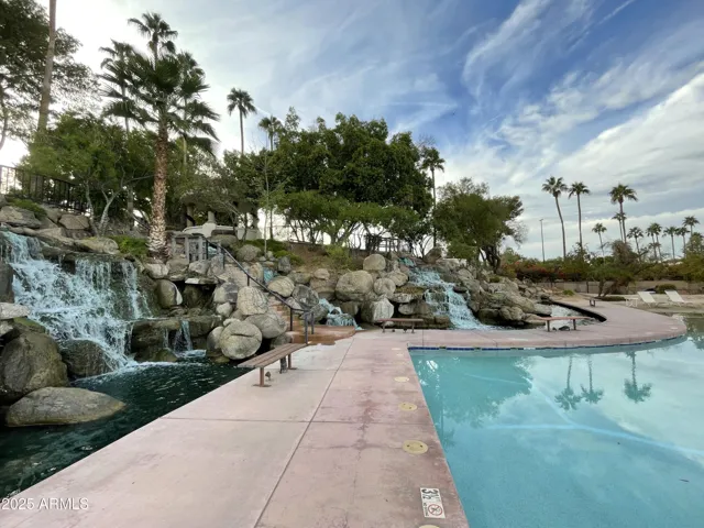 Beach Pool with Water Falls + Koi Fish Pond