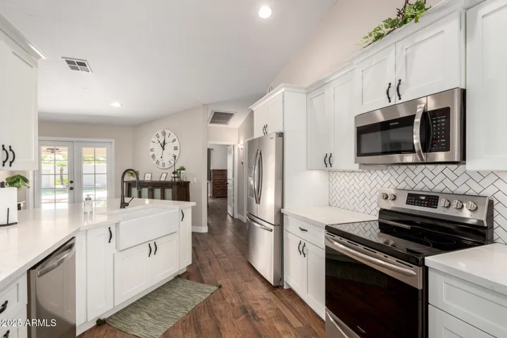 All new cabinets, quartz counters, and stainless steel appliances