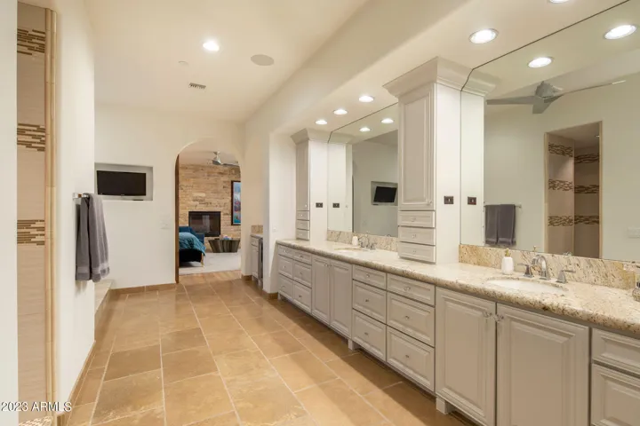 Spa-inspired bath with soaking tub, oversized shower, a generous walk-in closet.