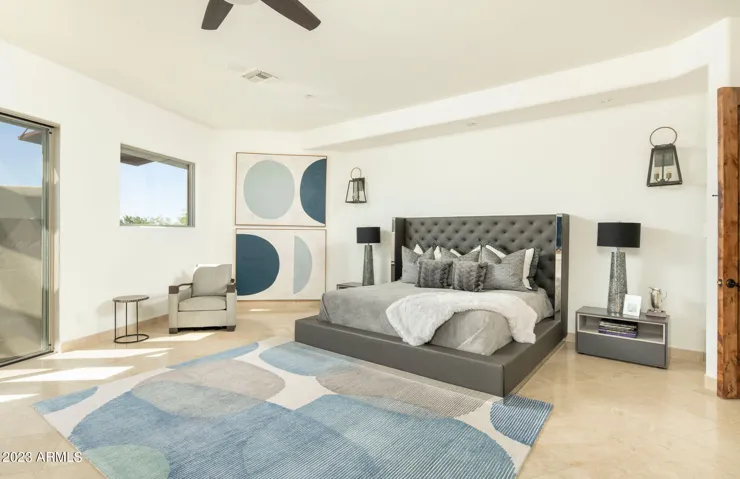 The only bedroom upstairs offers ideal separation and privacy, along with beautiful views, a see-through fireplace shared with the ensuite bath, generous walk-in closets, and a private den.