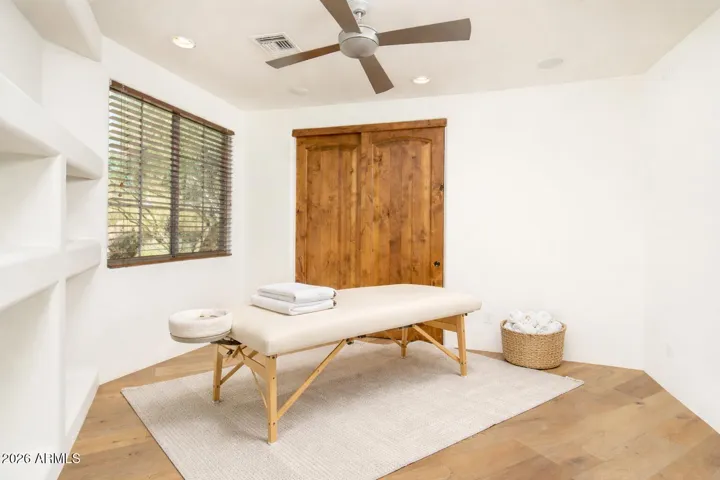 Located behind the media room with easy access to the pool bath to the spa and pool area. Perfect spot for a wellness room or can be a guest suite and bedroom #7.