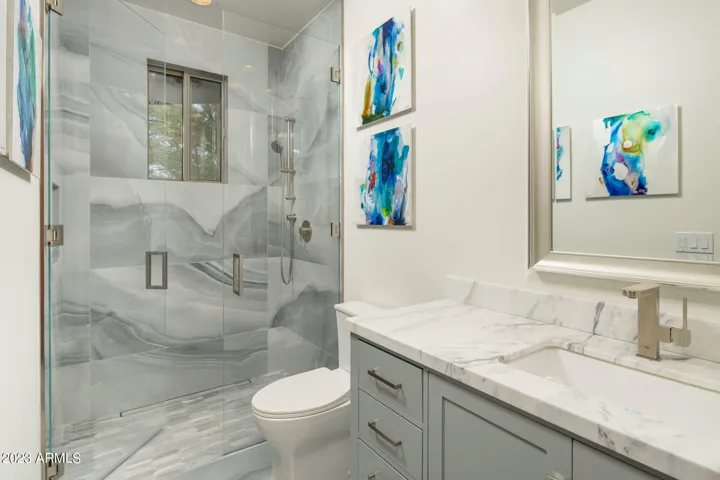 Clean finishes and natural light continue the home's refined design language.