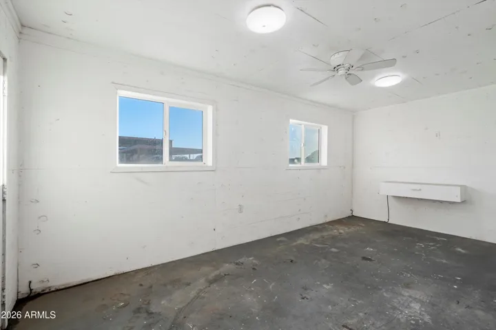 Private office located within the shop, offering separation from the main work area. Ideal for planning, administration, or quiet workspace.