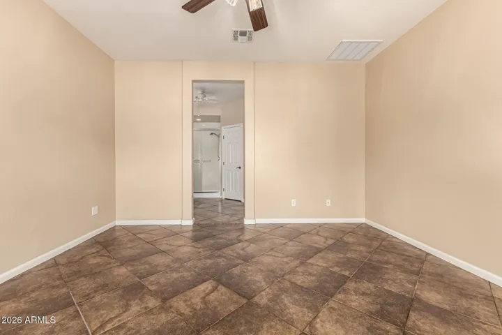 large open space with tile floor. Walls are like new, no holes. Perfect condition