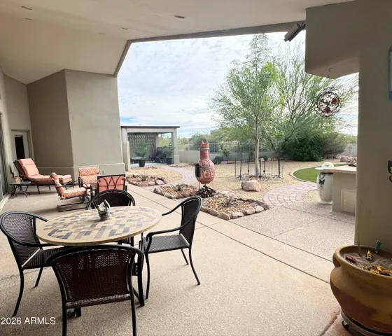 This Gold Canyon home has a covered patio spanning nearly the length of the home