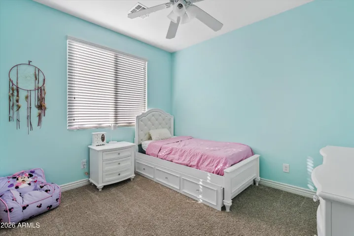 Cozy (but not small) bedroom. Ceiling fan.