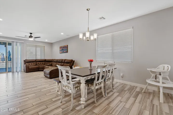 Dining area is in the middle of the great room and perfect for get togethers