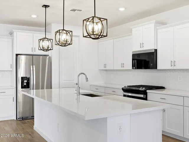 Photo is not of the actual home. Interior finishes and fixtures may vary.