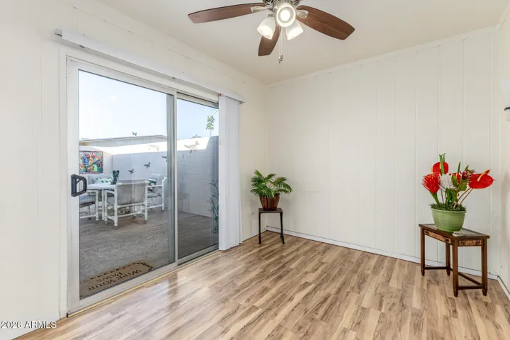 AZ room with walled patio through slider