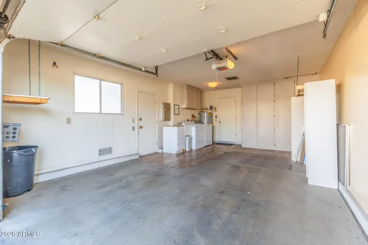Garage/laundry and door to pation area
