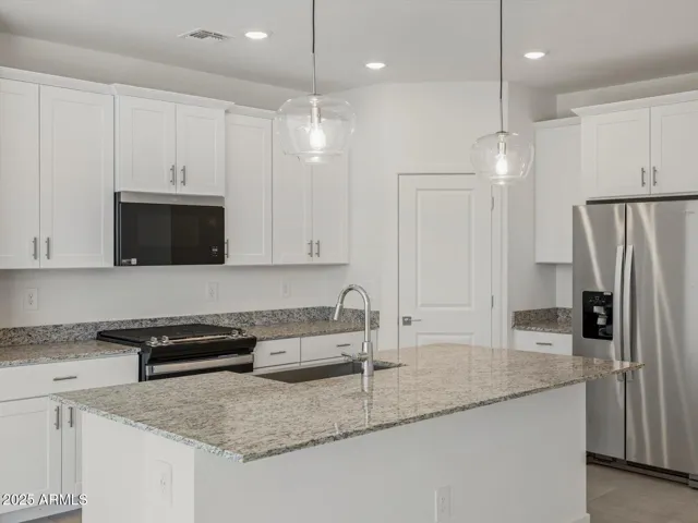 Photo is not of the actual home. Interior finishes and fixtures may vary