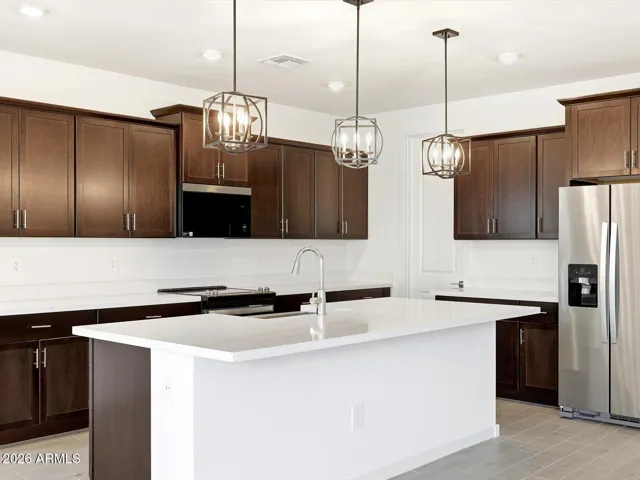 Photo is not of the actual home. Interior finishes and fixtures may vary.