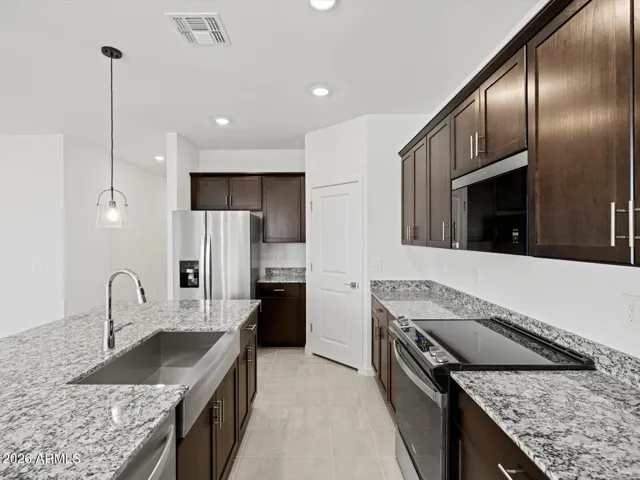 Photo is not of the actual home. Interior finishes and fixtures may vary