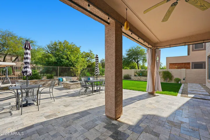 House backs up to landscaped lush wash. Feels very private!