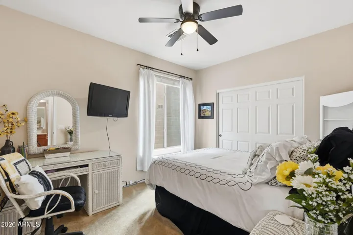 This bedroom is in a separate area with a full bathroom directly across. Great for multigenerational living!