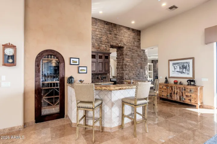 WET BAR AND 700 BOTTLE WINE ROOM
