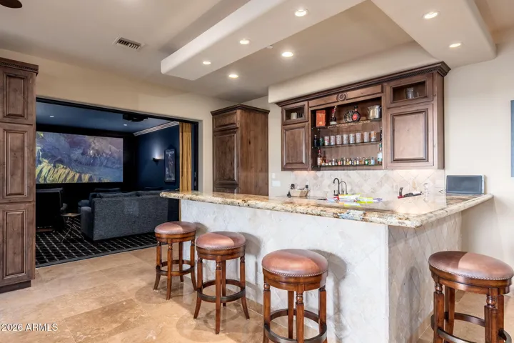 SIT AT THE BAR AND WATCH A MOVIE OR CLOSE THE MEDIA ROOM DOORS AND ENJOY THE SURROUND SOUND