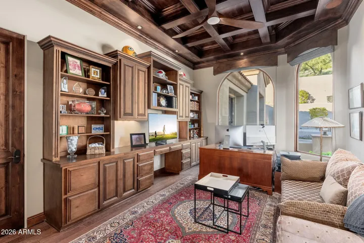 OFFICE WITH BEAUTIFUL MILL WORK ON THE CEILING AND BUILT INS AND WALK IN CLOSET