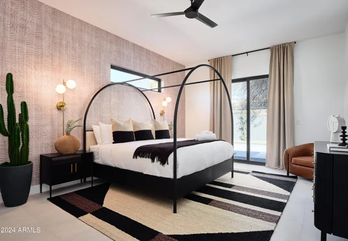2nd Bedroom featuring a King bed, a Smart TV, closet space, and an en-suite bathroom.