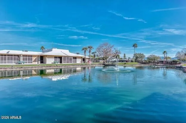 Palm Lakes Village lake and clubhouse