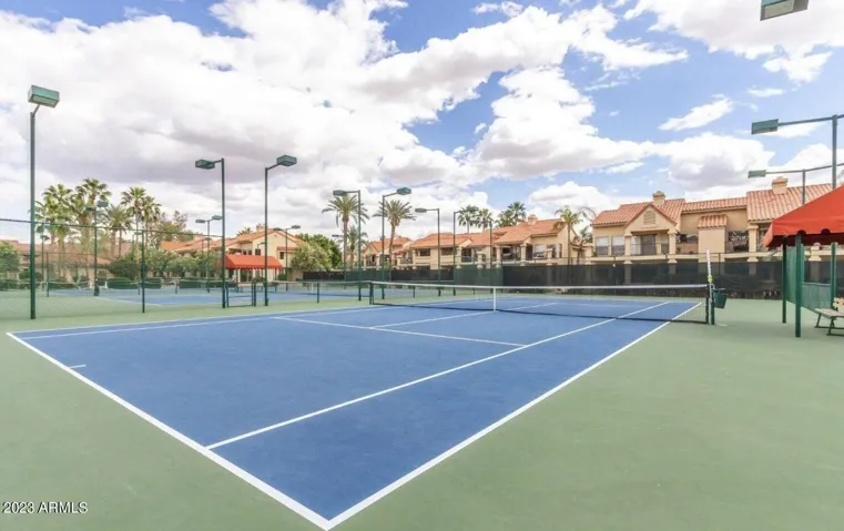 Professional-grade tennis courts with lighting and shaded seating provide year-round play in this Scottsdale gated community. Perfect for active residents who value fitness, recreation, and social events.