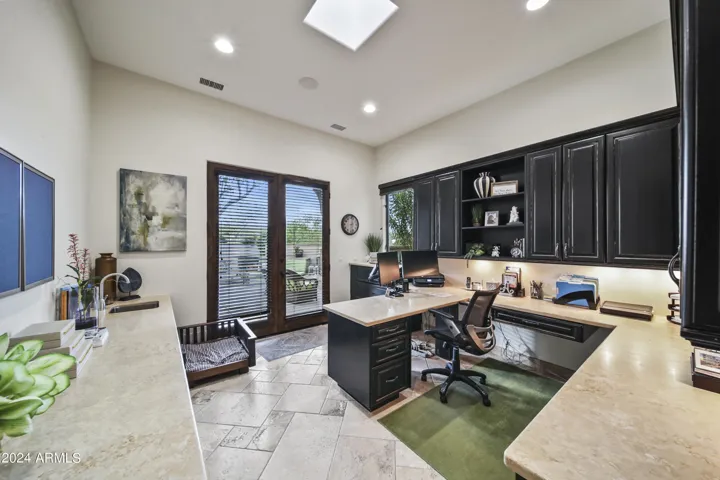 Versatile Executive Office Space with Custom Built-Ins. Custom sink for Artist in You.