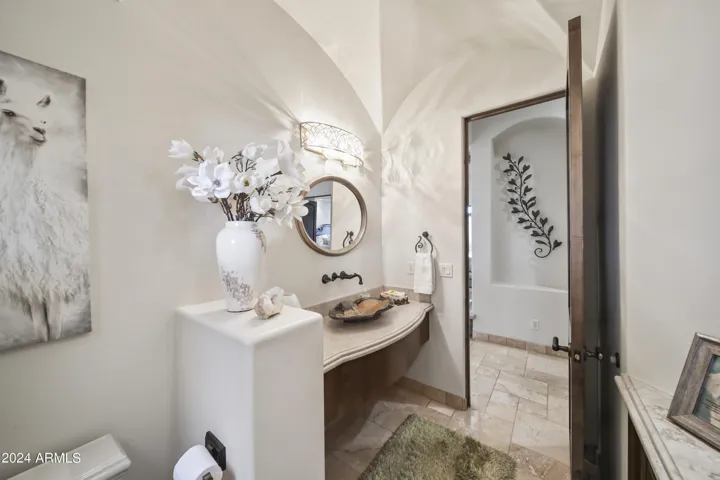 Foating Sink in Chic Half Bath. Stunning Ceiling Details Throughout