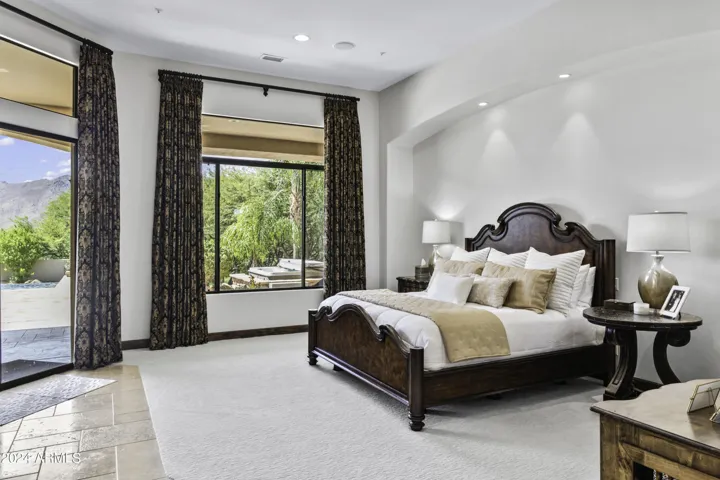 Luxurious Owner’s Suite with Fireplace and Patio Access