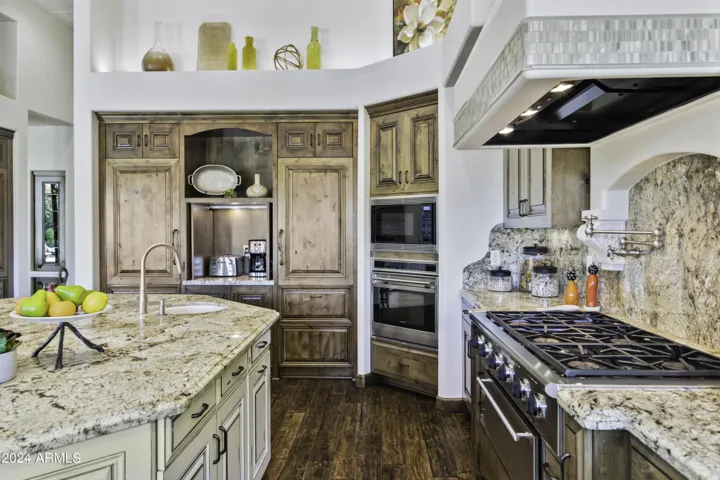 Gourmet Kitchen with Granite Countertops and High-End Appliances