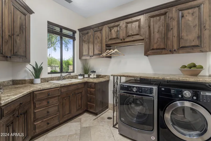 Laundry Room with Sink, Mop Sink & Tons of Storage & Abundant Natural Light