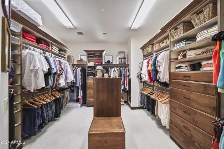 Beautifully Designed Closet with Custom Cabinetry