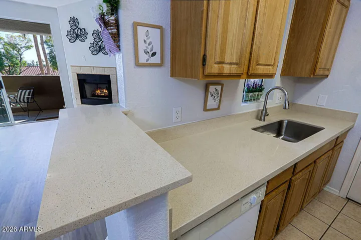 View looking to Living Area from entrance to Kitchen.