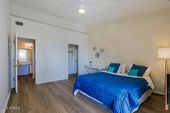 Looking at Bedroom from Sliding Door to Balcony. Entrance on left, Walk-in Closet to right.