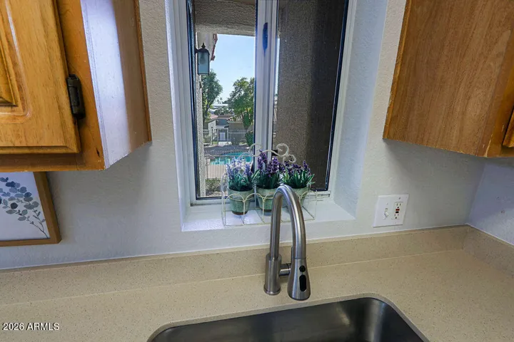Kitchen with nice view from window above sink.