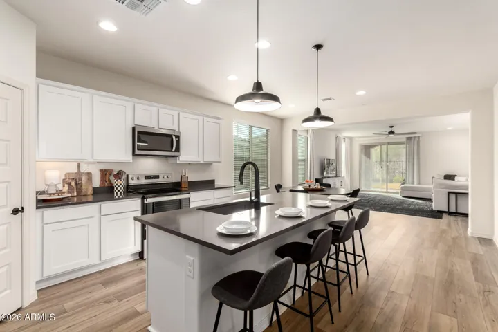 This designer kitchen serves as the heart of this home.