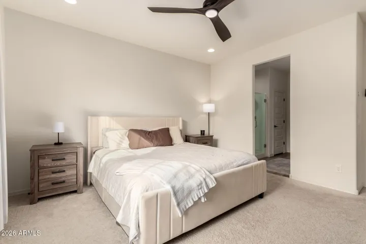 Split floor plan with primary at the back of the home for privacy.