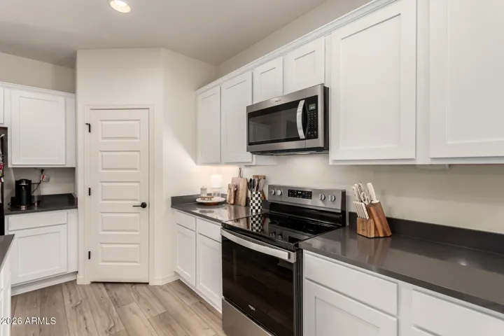 Storage is never an issue thanks to this walk in pantry.