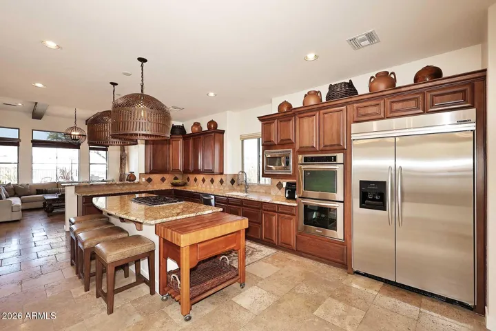 Kitchen features oversized built-in refrigerator/freezer