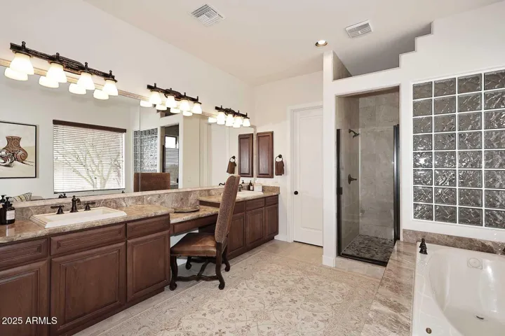 Double sinks and vanity in primary bath