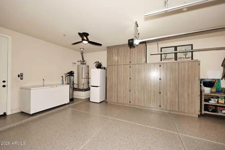 Garage has built-in cabinetry